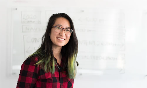 Business professional scheduling appointments on tablet